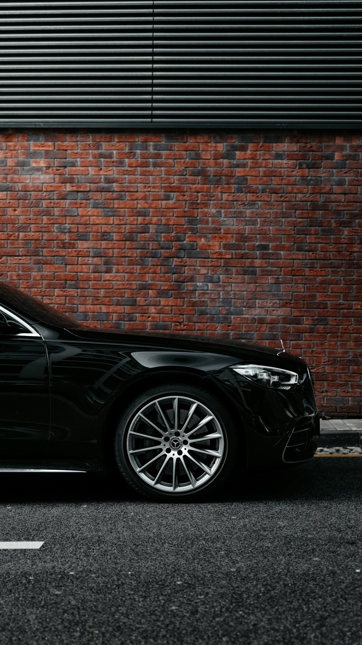 Black executive car ready for an airport run