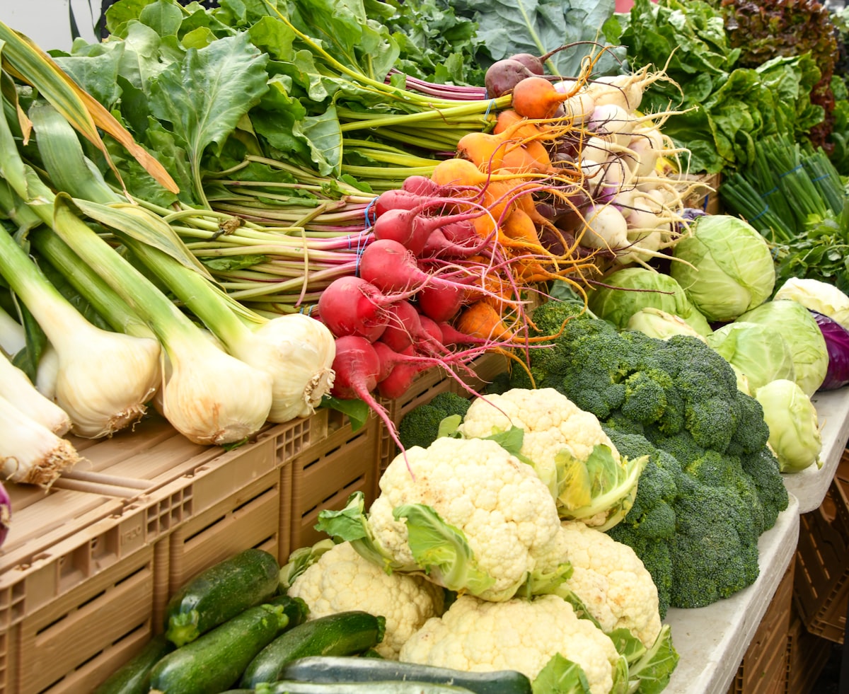 Crates of fresh vegetables at a market